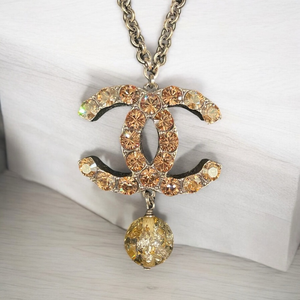 Chanel 06 XL Champagne CC Crystal Dangle Pendant Necklace.